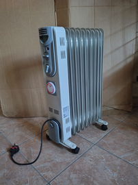 Grzejnik olejowy 2kw na kółkach z timerem