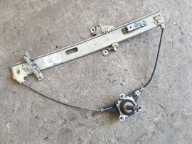 MAZDA 323 323F BJ 99- podnośnik szyby prawy przód man.