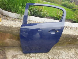 OPEL CORSA D 06-14 drzwi lewe tył