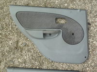 KIA RIO I LIFT 04-05 tapicerka boczek drzwi L tył