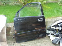 KIA CARNIVAL 99-05 drzwi lewe przód kpl. BDB