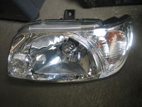 DAIHATSU MOVE 02-05 reflektor Lewy (el.)