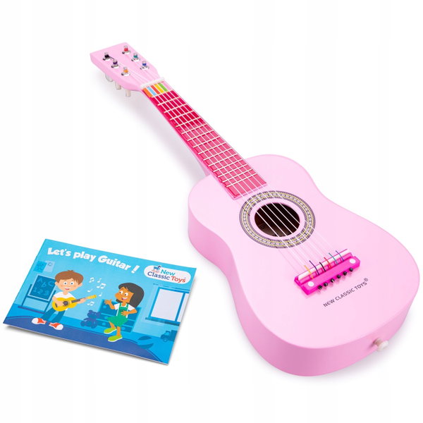 Różowa gitara z paskiem i instrukcją, pierwsze kroki w śpiewie