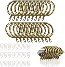 Zestaw 24 metalowych kółek do zasłon z klipsami.