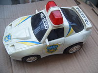 radiowoz auto policja koguty syrena wyje retro autko stara zabawka vitage