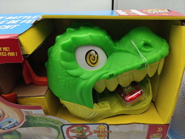 HOT WHEELS CITY ZESTAW TORÓW ZAKRĘCONY TOR REMIZA T-REXA + autko
