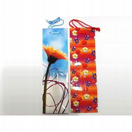 Torebka na koniak, 33x10 cm, wzór kwiaty, mix kolorów.